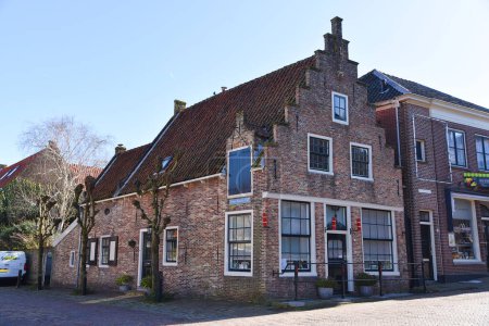 Foto de Broek en Waterland, Países Bajos. Febrero de 2023. Fachadas históricas en Broek en Waterland. Foto de alta calidad - Imagen libre de derechos