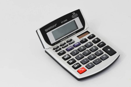Photo for Netherlands, November 2023,. Close up of a bussiness calculator isolated on white. High quality photo - Royalty Free Image