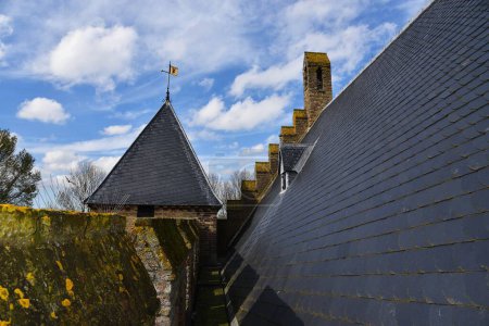 Medemblik, Netherlands. March 29, 2024. the roof construction with cantaloupes of an old castle. High quality photo