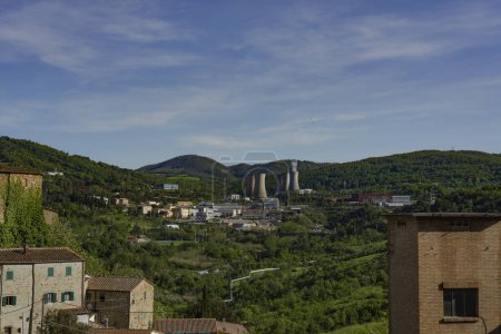 Panoramic view of the geothermal power plant for the production of electricity in Larderello, Pisa, Italy