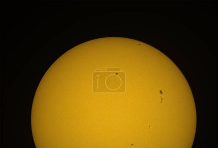 Photo for The Sun in visible light with sunspot, April 2024. During solar maximum, large numbers of sunspots appear - Royalty Free Image