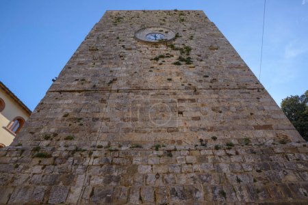 Photo for View of the Torre del Candeliere, a medieval tower with clock. Massa Marittima, Grosseto, Tuscany, Italy - Royalty Free Image