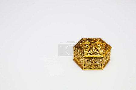 Photo for Golden gift box on white background with copy space space. - Royalty Free Image