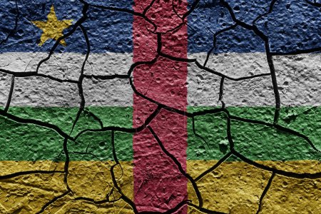 Téléchargez les photos : Central African Republic flag on a mud texture of dry crack on the ground - en image libre de droit