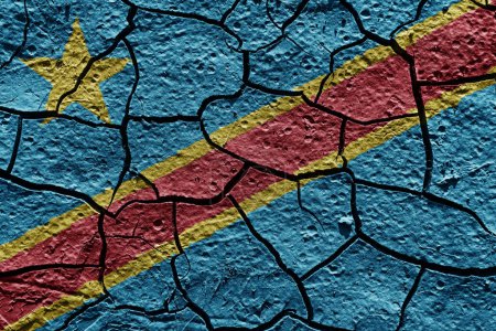 Téléchargez les photos : Congo flag on a mud texture of dry crack on the ground - en image libre de droit