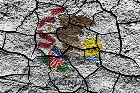 Téléchargez les photos : Illinois state flag of United States on a mud texture of dry crack on the ground - en image libre de droit