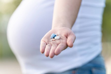 Photo for Conceptual image about the medicines to be taken when you are pregnant - Royalty Free Image