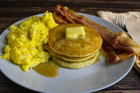Photo for Pancakes with bacon and scrambled eggs - Royalty Free Image