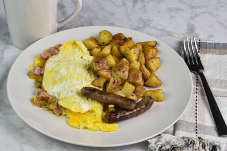 spam western omelette served with breakfast sausage and home fries