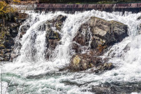 water flowing over the rocks at the quabbin spillway  located in the quabbin reservoir
