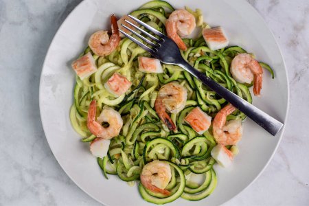 zucchini noodles  served with  sauteed shrimp and crab chunks,