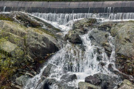 water over  over the  rocks at the spillway of the quabbin reservoir