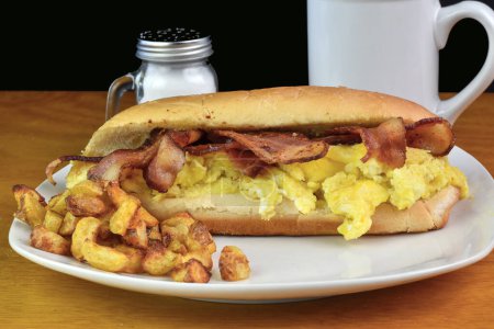 scramble egg  and bacon breakfast sub with home fries