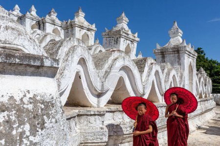 Photo for Mingun, Mandalay,Myanmar, November 16, 2021: Monks standing in temple Myanmar - Royalty Free Image