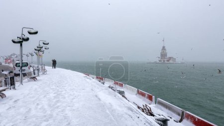 Photo for Maiden's Tower and skdar district under snowfall - Royalty Free Image