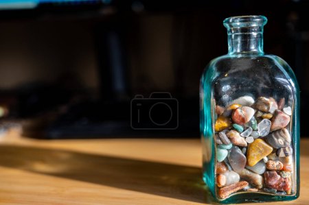 Photo for Collection of memories half filling a glass jar. - Royalty Free Image