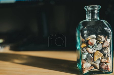 Photo for Collection of memories half filling a glass jar. - Royalty Free Image