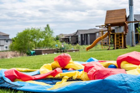 Photo for Deflated bouncy house in backyard. High quality photo - Royalty Free Image