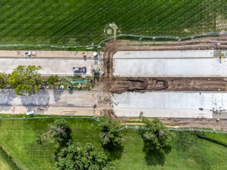 Photo for Overhead view of road construction on a partitioned road with tracked dirt. . High quality photo - Royalty Free Image