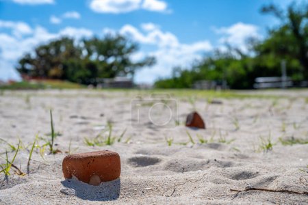 Deteriorated brick in the sandy beach outside Fort Jefferson on Dry Tortugas National Park. High quality photo