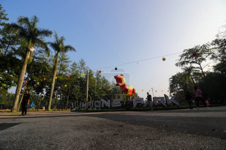 Photo for Bandung, West Java, Indonesia - July 31, 2022: Bandung Lampion park landscape in the morning. Located in Tegalega Bandung, this park is filled with various dinosaur-shaped lanterns. - Royalty Free Image