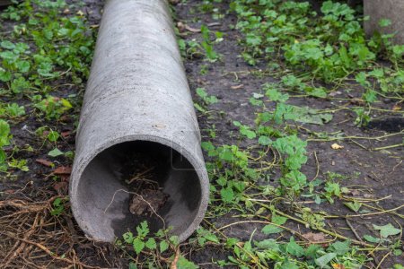 old asbestos pipe on the ground close up. High quality photo