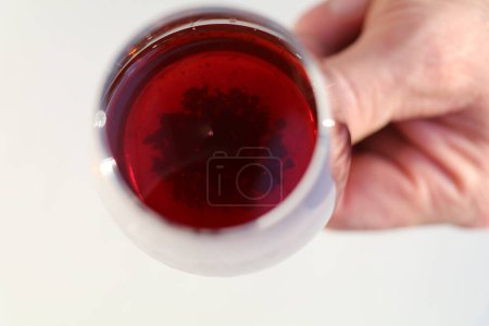 Photo for Top view of wine sediments in a glass of cloudy red wine - Royalty Free Image