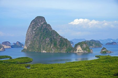 Samet Nangshe, Beautiful panoramas of the surrounding scenery and the vast expanse of the Phang-Nga Bay with turquoise waters, craggy limestone peaks towering over vivid green mangrove forests.