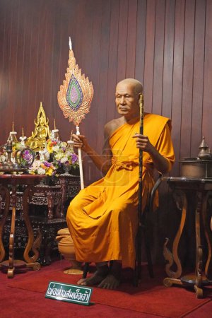 Photo for 28 June 2023 Phuket, Thailand Waxwork of "Luang Por Cham" the famous monk at Wat Chalong temple. Thai language on label is name of monk is Luang Por Cham" in English translation - Royalty Free Image