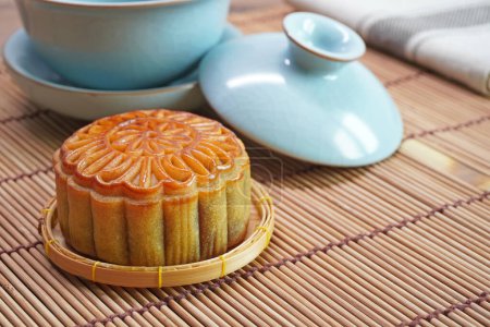 Photo for Moon cake for Mid autumn festival , Retro vintage style of Chinese traditional food and dessert. ( Moon cake is call " yue bing " in chinese language) - Royalty Free Image