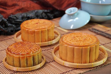 Photo for Moon cake for Mid autumn festival , Retro vintage style of Chinese traditional food and dessert. (Moon cake is call " yue bing " in chinese language) - Royalty Free Image