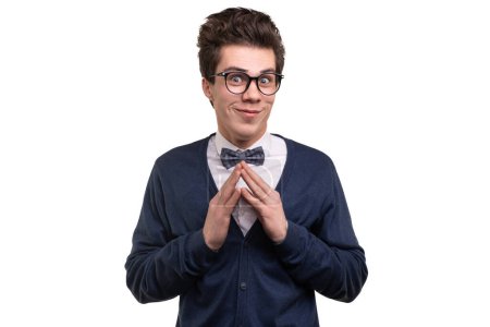 Photo for Crafty young man in glasses connecting tips of fingers and looking at camera with smile while having plan against white background - Royalty Free Image