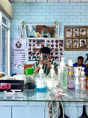 Photo for Hair cut selfie at barber shop Thai style, 11 January 2024 , Buriram Thailand. - Royalty Free Image
