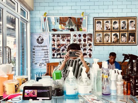 Photo for Hair cut selfie at barber shop Thai style, 11 January 2024 , Buriram Thailand. - Royalty Free Image