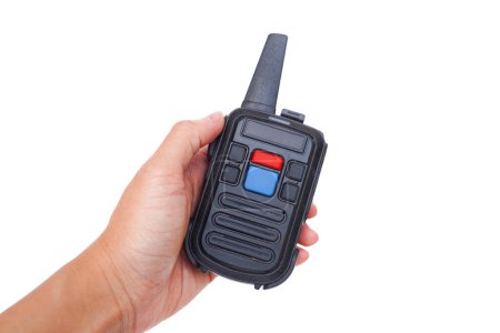 The left hand holds a walkie talkie radio communication on white isolated background.