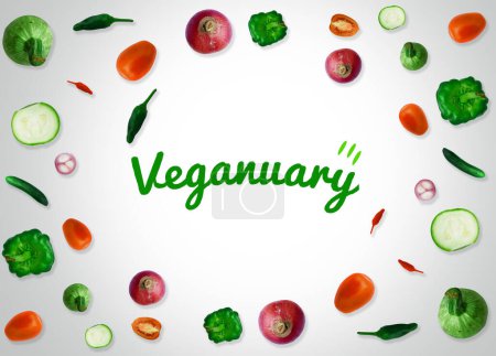Téléchargez les photos : Veganuary au lieu de janvier fond avec des légumes et typographie au centre. Veganuary conception de papier peint - en image libre de droit