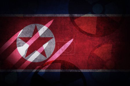 Foto de Bandera de Corea del Norte con señales de misiles nucleares y efecto de textura grunge. Corea del Norte armamento atómico concepto fondo. - Imagen libre de derechos