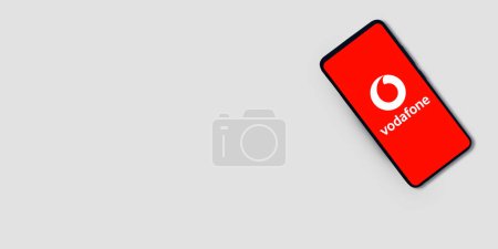 Photo for Vodaphone Editorial backdrop banner inside mobile screen with empty space - Royalty Free Image