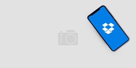 Photo for Dropbox mobile application with copy space for text, editorial backdrop - Royalty Free Image