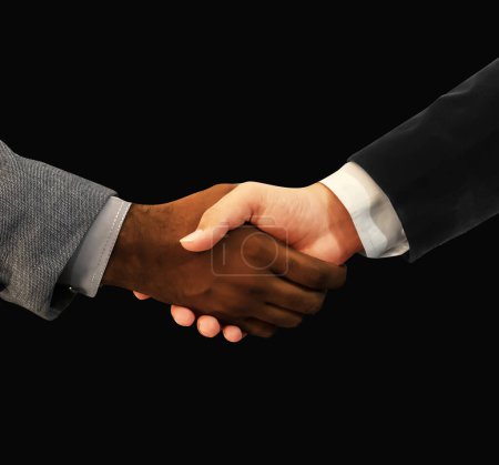 Photo for Dark and Fair complection hands shaking diversity concept backdrop with both hands. Diversity handshake of different ethnicity - Royalty Free Image