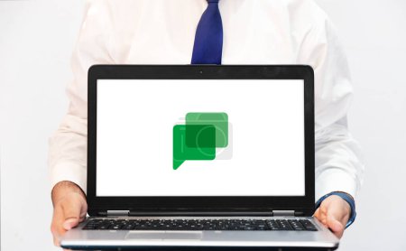 Photo for Google Chat messaging app on the laptop screen, editorial background - Royalty Free Image