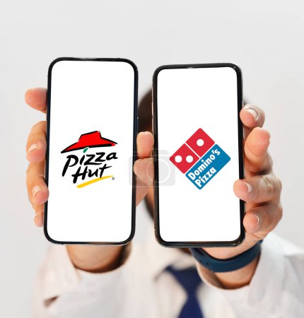 Photo for Best pizza comparison between Pizzahut and Domino's Pizza, editorial background - Royalty Free Image