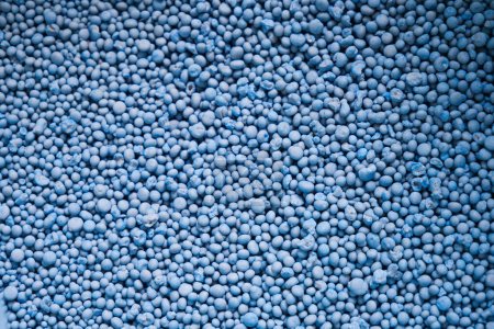 Photo for Chemical fertilizer pellets ready for use in agricultural plots, formula NPK 15-15-15 for decorating projects. - Royalty Free Image
