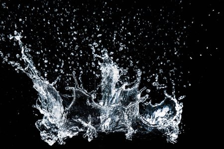 Photo for Splashing water on a black background. water splash refreshing black background - Royalty Free Image