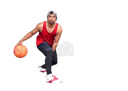 Téléchargez les photos : Joueur de basket tenant une balle et sautant avec le chemin de coupe - en image libre de droit