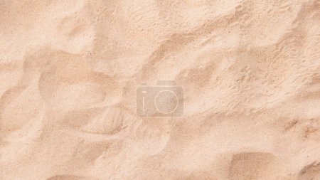 Téléchargez les photos : Vue du dessus du sable sur la plage, décor naturel - en image libre de droit