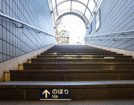 Photo for Tokyo, Japan, January 2024.  the steps of the staircase at the entrance of a subway station in the city center - Royalty Free Image