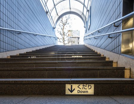 Photo for Tokyo, Japan, January 2024.  the steps of the staircase at the entrance of a subway station in the city center - Royalty Free Image