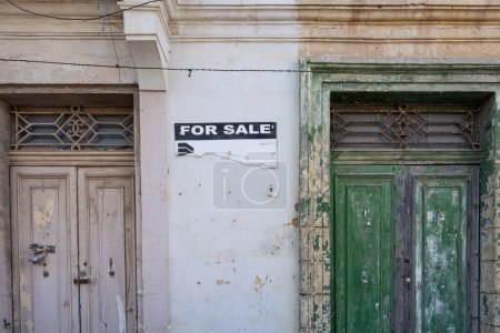 Photo for Valletta, Malta, April 03, 2024 the sign with the words For Sale in a dilapidated building in the historic center of the city - Royalty Free Image