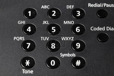 Photo for Close up telephone or facsimile or fax keypad with rectangular buttons. - Royalty Free Image